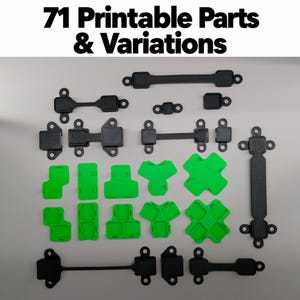 May include: A collection of 71 printable parts and variations, featuring black and bright green plastic components with various geometric shapes, including connectors, brackets, and handles with screw holes for assembly and construction.
