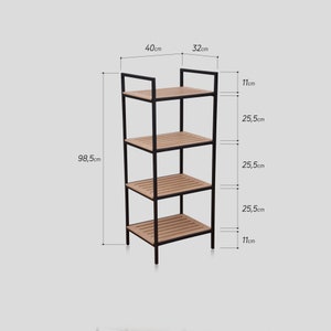 May include: Black metal shelf unit with four wooden shelves. The shelf is 32 inches wide, 40 inches tall, and 98.5 inches deep.