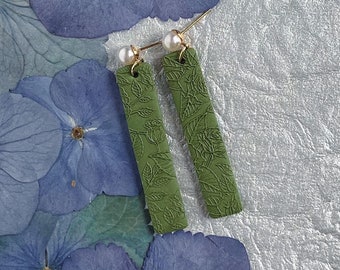 Amara Dangles forest green. Handmade polymer clay earrings. Sleek skinny rectangle shape. Statement earrings. Embossed flowers. Pearl stud.
