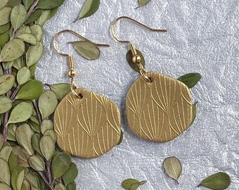 Maggie Dangles gold. Handmade polymer clay earrings. Modern organic shape. Statement earrings. Embossed texture. Stylish earrings.