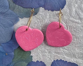 Julia Dangles pink. Handmade polymer clay earrings. Embossed floral design. Stylish earrings for any season. Cute heart shape.
