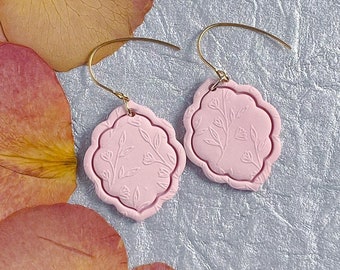 Christina Dangles pink. Handmade polymer clay earrings. Embossed floral design. Unique scalloped shape. Lightweight earrings.