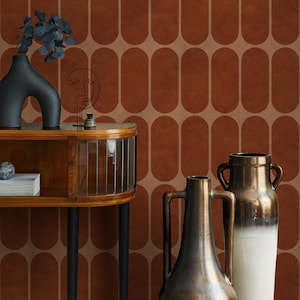 May include: An interior scene with a wooden cabinet, black vases, and decorative pottery. The background is a textured, rust-coloured wallpaper with an oval pattern. The scene has a mid-century modern aesthetic, evoking a sense of vintage elegance.