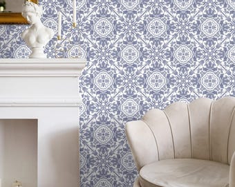 May include: A patterned wallpaper featuring a repeating design in shades of blue and white. The design includes floral and geometric elements, creating a classic, decorative look. A white fireplace, a bust, and a beige armchair are in the foreground.
