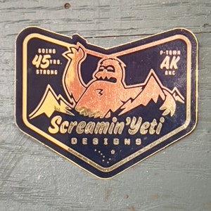 SYD-45yrs. - AK Blue & Gold - Metallic - Digital die-cut sticker, printed on gold metallic vinyl, outdoor rated 3-5 yrs.