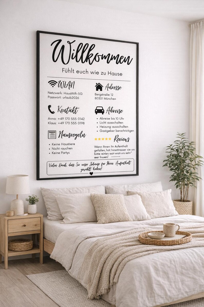 May include: A framed sign with German text, "Willkommen," above information about Wi-Fi, contact details, and house rules. The sign is above a bed with beige bedding, pillows, and a wooden tray with a mug.