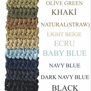 May include: A vertical strip of crocheted raffia yarn showing eight distinct color swatches labeled as Olive Green, Khaki, Natural (Straw), Light Beige, Ecru, Baby Blue, Navy Blue, Dark Navy Blue, and Black, arranged in a stacked sequence.