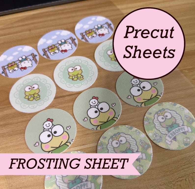 May include: A collection of circular edible frosting sheet toppers featuring various illustrations of Keroppi and Hello Kitty characters. The images include Keroppi in different poses and scenes, printed on a thin, flat, precut sheet material.