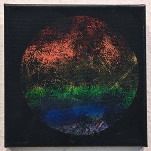 May include: A circular abstract painting on a black canvas. The circle is painted in shades of red, orange, yellow, green, blue, and purple. The colors are blended together to create a rainbow effect.