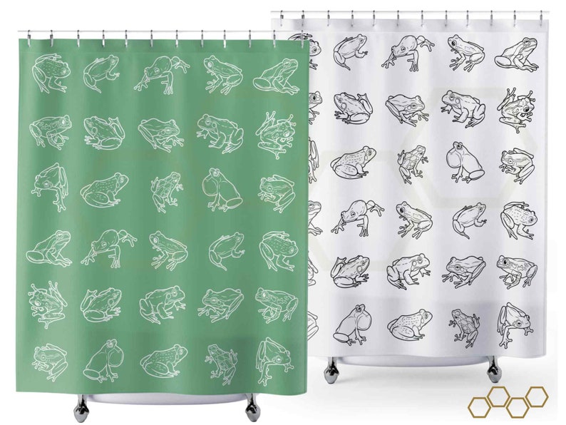 May include: Two shower curtains with a white frog pattern on a green and white background. The shower curtains are hung on a shower rod.
