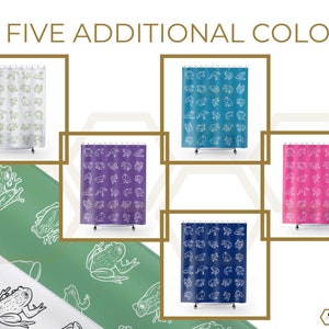 May include: Five different color shower curtains with a white outline of frogs on a colored background. The colors are green, purple, blue, pink, and light blue.