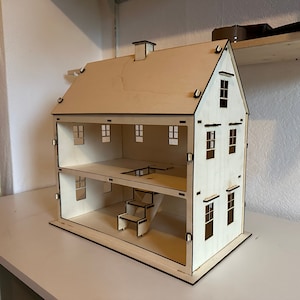 Wooden dollhouse kit image 1