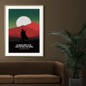 May include: A minimalist poster with a silhouette of a figure in a cape standing in front of a red and green landscape with a large moon in the sky. The text reads "He means more to me than you will ever know. The Mandalorian."