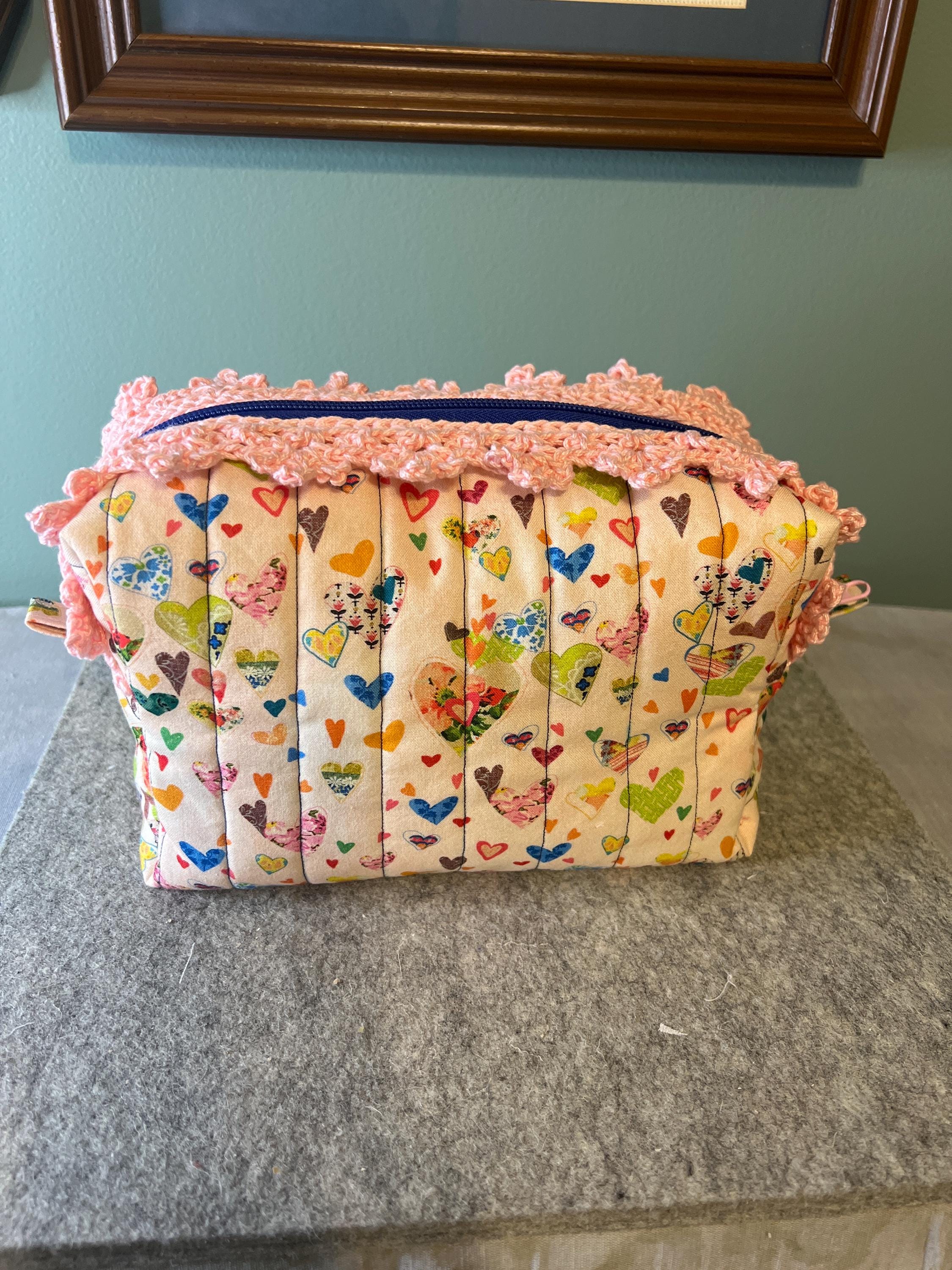 26 Crochet Makeup Bag Patterns with Clutches, Pouches, and Holders 17 Quilted Makeup Bag with Crochet Lace