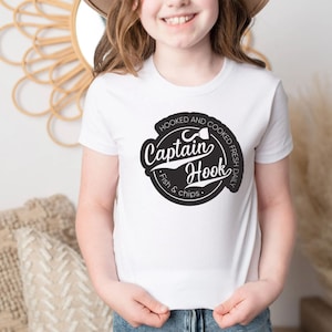 May include: White t-shirt with a black and white logo that says "Captain Hook" and "Hooked and Cooked Fresh Daily Fish & Chips".