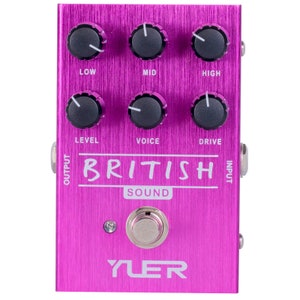 May include: A pink YLER British Sound guitar effects pedal with knobs labeled "Low", "Mid", "High", "Level", "Voice", and "Drive". The pedal has an input and output jack, a footswitch, and the text "BRITISH SOUND" printed on the front.