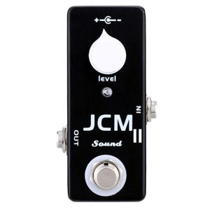 May include: Black guitar pedal with white text and a large white knob. The pedal has "JCM II Sound" printed on it, along with "IN" and "OUT" jacks. A small LED light is visible below the knob.