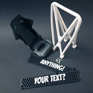 Transform your workspace with this incredible customizable DIY racing seat phone holder kit. It features an unassembled roll cage design that allows you to create a unique and stylish phone stand for your desk. Elevate your workspace today! Nine3D