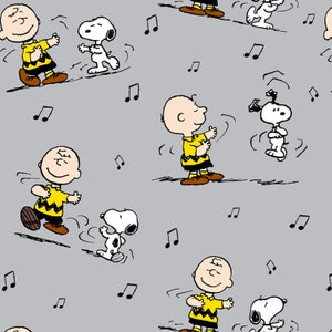 Peanuts Dancing Charlie Brown and Snoopy the Dog 100% Cotton Fabric 3852