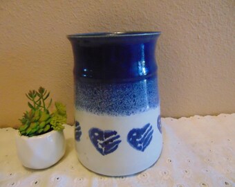 Beautiful Hand Made Stoneware Pottery Crock jar featuring white base with blue painted hearts.