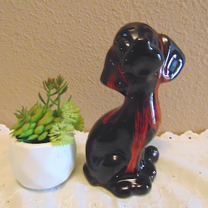 Darling Vintage Canuck Pottery Hound Dog with red orange drip glaze over a black/brown base