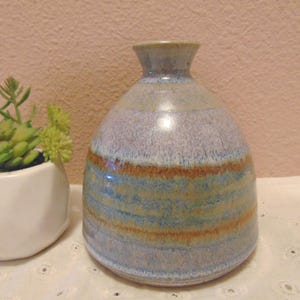 Beautiful Vintage Artist Signed Stoneware Studio pottery vase with textured glaze, round body and narrow neck.