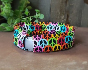 Peace symbol collar slip cover. Easy to slip over existing collar. Machine washable. Protects collar from dirt. Smooth fit no ruffle design