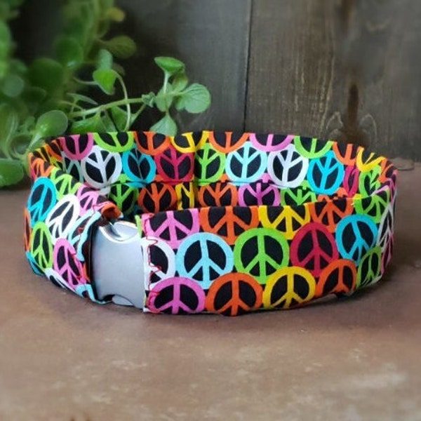 Peace symbol collar slip cover. Easy to slip over existing collar. Machine washable. Protects collar from dirt. Smooth fit no ruffle design