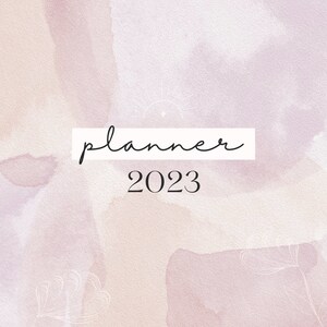 May include: A watercolor background with a soft pink and white color scheme. The text "planner 2023" is written in black font.