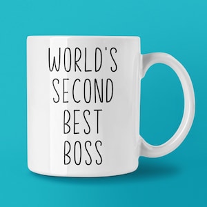 May include: White ceramic mug with black text that reads "WORLD'S SECOND BEST BOSS".