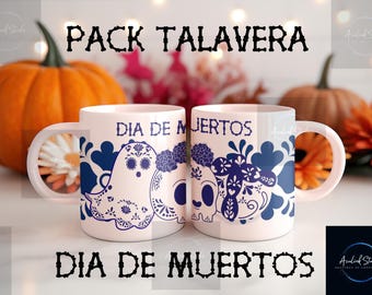 May include: Two white ceramic mugs with blue Day of the Dead designs. One mug features a ghost, the other a skull, both with floral patterns. The mugs are labeled "DIA DE MUERTOS" and "PACK TALAVERA". Pumpkins and flowers are in the background.