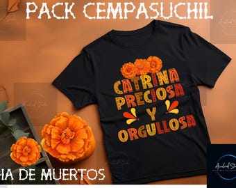 May include: Black t-shirt with the text "Catrina Preciosa y Orgullosa" in orange and yellow, with orange flower graphics. The words "Pack Cempasúchil" and "Dia de Muertos" are also visible.