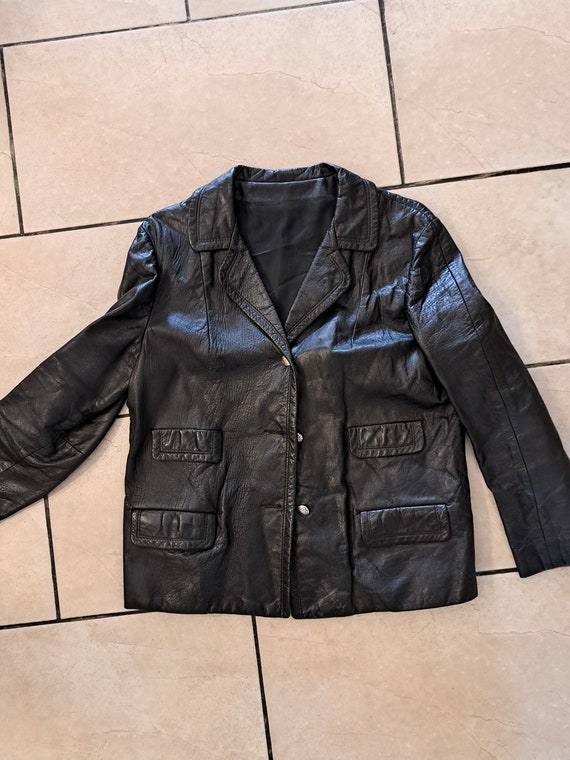 Très jolie veste en cuir noir vintage medium