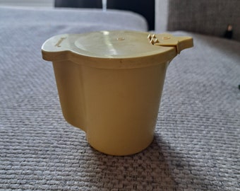 Vintage yellow Tupperware sugar bowl