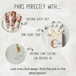 May include: A collage of three images showcasing bath and body products. The top image shows a collection of small glass bottles filled with pink bath salts. The middle image shows a box of small white heart-shaped soaps. The bottom image shows a glass car diffuser with a floral design. The text "PAIRS PERFECTLY WITH..." is at the top of the image. The text "NATURAL BATH SALT", "MINI HEART SOAP", and "NATURAL LONG LASTING CAR DIFFUSER OIL" are below each image. The text "Just one click away-find the link in the description!" is at the bottom of the image.