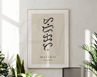 May include: A framed print with a beige background and black calligraphy. The calligraphy reads "marikit" and "beautiful".
