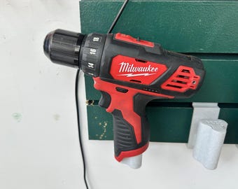 3D Printed Milwaukee M12 Slatwall Tool Holder