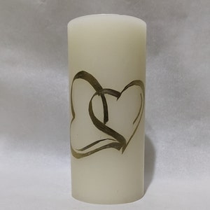 Gold Heart Candle - Our beautiful Entwined Golden Hearts Candle is an Elegant add-on for all Special Occasions, Weddings, and Anniversaries.