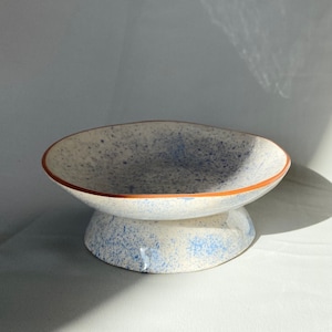 Ceramic stand cup.