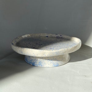 Ceramic stand cup.