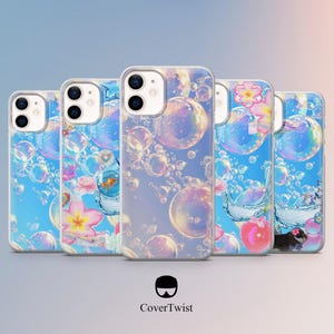 May include: A collection of clear phone cases with bubble designs. The cases feature various designs with bubbles, flowers, and aquatic elements. The CoverTwist logo is at the bottom.