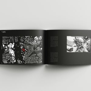 May include: A black and white image of a book open to a page with a map of a city and a black and white photo of a statue of a man with a beard. The map shows a red circle around a specific location. The text "SITE" is visible at the top of the page.