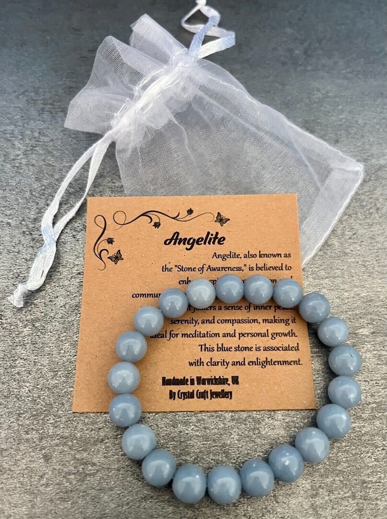 Blue Angelite Stretch bracelet with descriptive card and a white organza gift bag