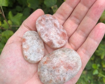 SONNENSTEIN Palm Stone Naturkristall Wählen Sie zwischen groß, mittel oder klein