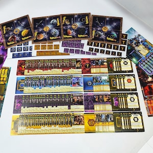 May include: A collection of board game components, including game boards, cards, and tokens. The game boards feature a space theme with planets and galaxies. The cards and tokens have various colors and designs, suggesting a strategy or adventure game.