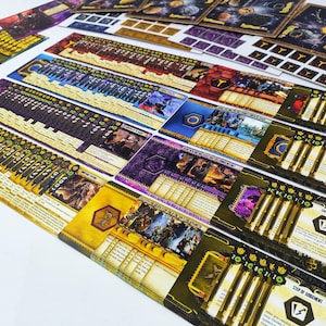 May include: A collection of colorful board game components, including cards, tokens, and game boards. The cards feature illustrations and text, with a variety of colors such as yellow, purple, and blue. The components are arranged on a white surface.