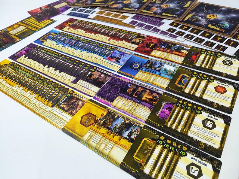 May include: A collection of colorful board game components, including cards, tokens, and game boards. The cards feature illustrations and text, with a variety of colors such as yellow, purple, and blue. The components are arranged on a white surface.