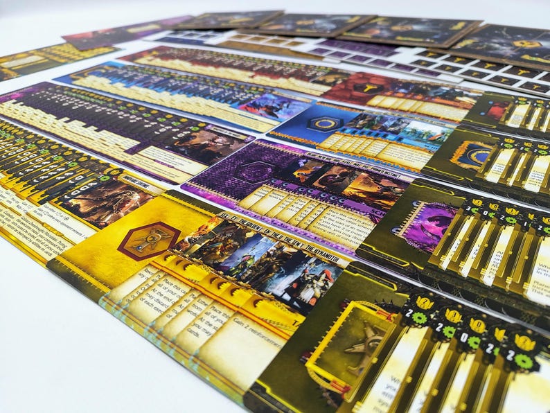 May include: A collection of colorful game cards and components, featuring illustrations and text. The cards have a variety of designs, including images of characters and symbols, with a mix of yellow, purple, and blue hues. The cards are arranged on a white surface.