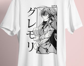May include: White t-shirt with a black and white illustration of an anime character with long hair. The text "グレイモ" and "リィアス" is printed on the shirt.
