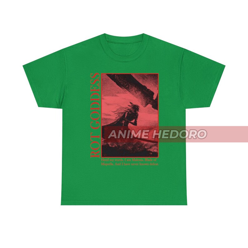 May include: Green t-shirt with a red graphic print of a character from the anime "Rot Goddess". The graphic features a character with a sword and a red background. The text "Rot Goddess" is printed vertically on the left side of the graphic. The text "Hand to my work, I am Malena, Bride of Wrath, And I have never known defeat" is printed below the graphic.